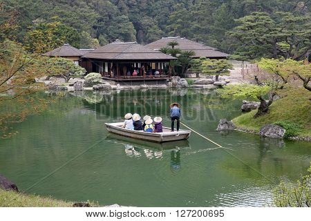 Kagawa, Japan - April 10, 2016 - The small tourist ship of the pond of Riturin Park Garden in Takamatu, Kagawa, Japan on 28th April 2016
** Note: Visible grain at 100%, best at smaller sizes