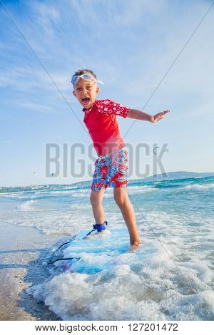 Young little boy learning to surf board
** Note: Visible grain at 100%, best at smaller sizes