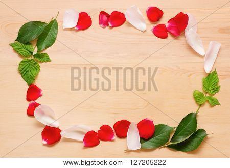 Frame On A Wooden Background Of Flowers And Leaves