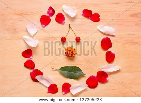 Frame On A Wooden Background Of Flowers And Leaves