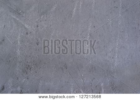 Heterogeneous concrete background with traces of spatula.