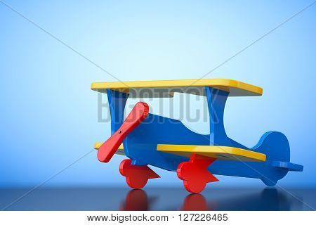 Toy Multicoloured Biplane on a blue background. 3d Rendering