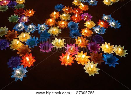 Many of colourful Floating candles - relaxation concept