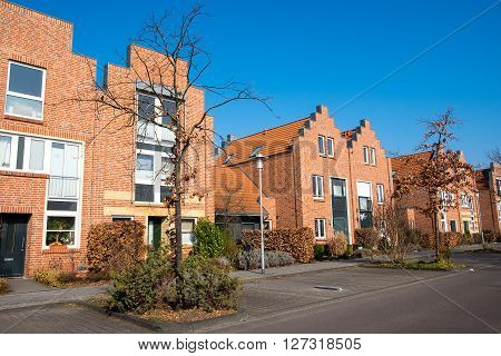 Modern neighborhood with red brick houses in Berlin, Germany