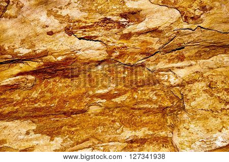 Textured red iron ore surface, close up