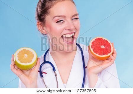 Happy Dietitian Nutritionist With Grapefruits.