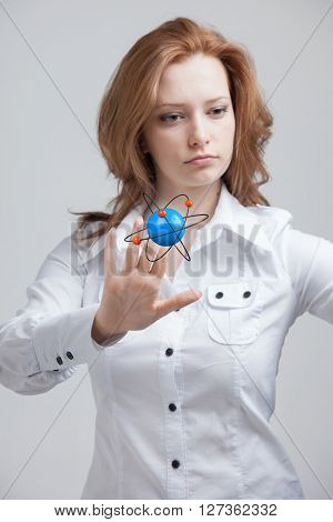 Woman scientist with atom model, research concept