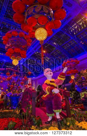LAS VEGAS - FEB 14 : Chinese New year in Bellagio Hotel Conservatory & Botanical Gardens on Februery 14 2016 in Las Vegas. There are five seasonal themes that the Conservatory undergoes each year.