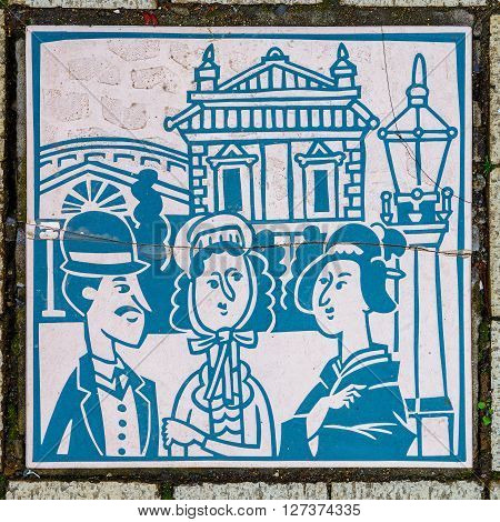YOKOHAMA JAPAN - NOVEMBER 24 2015: Signs along footpath on the side of streets in Yokohama Chinatown