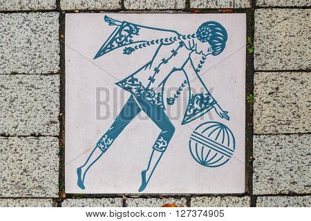 YOKOHAMA JAPAN - NOVEMBER 24 2015: Signs along footpath on the side of streets in Yokohama Chinatown