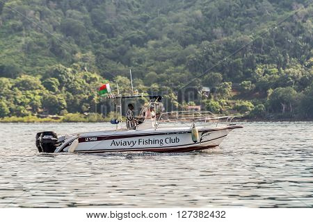 Hell-Ville Madagascar - December 19 2015: The speedboat of the Aviavy Fishing Club floats along the Hell-Ville harbour Nosy Be Island Madagascar.