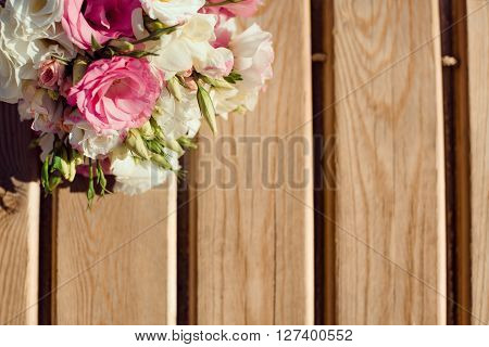 Bride's Pink and White Bouquet Laying on Pier. Wedding in Tropical Country Idea
** Note: Shallow depth of field