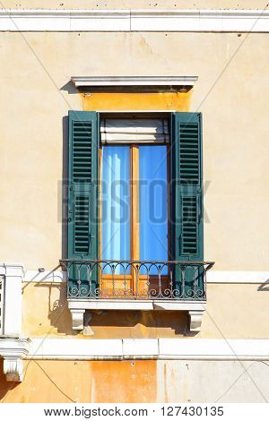Typical old wndow with shutters in Venice, Italy
