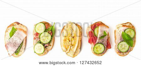 Different tartines on the white background wide screen
