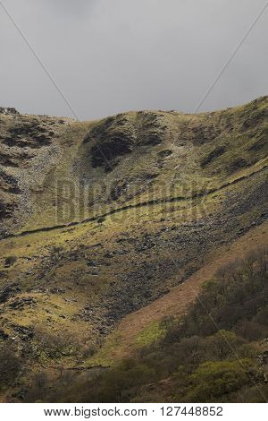 Lady of Snowdon. Face profile on a steep hillside in Snowdonia near Llanberis Gwynedd Wales UK.