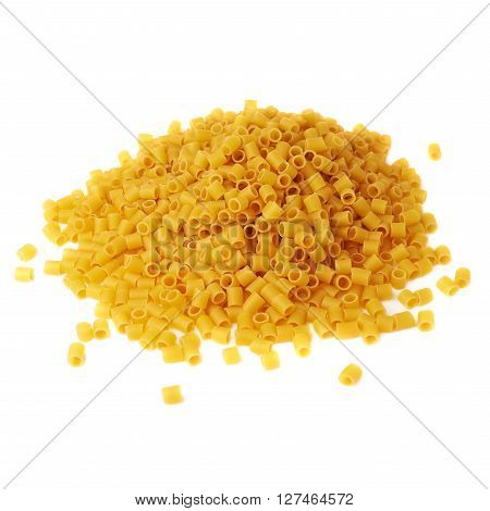 Pile of dry ditalini yellow pasta over isolated white background