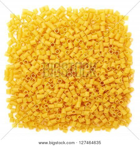Pile of dry ditalini yellow pasta over isolated white background