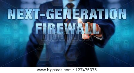 Corporate manager is touching the technology buzzword NEXT-GENERATION FIREWALL on an interactive visual display. Information technology concept for an identity-based security approach.
