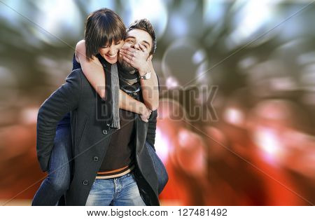 Young couple in love having fun outside