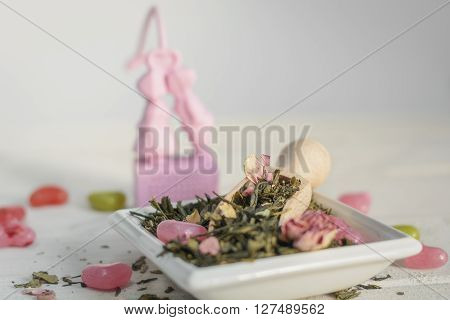 The leaves of green tea on the saucer.