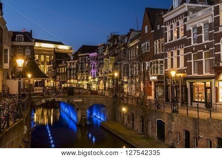 Utrecht, The Netherlands - March 14, 2015: Utrecht at night Vismarkt Houses canal and restaurants.