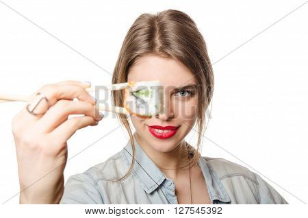 Beauty Woman with  Sushi in front of her eye on white background