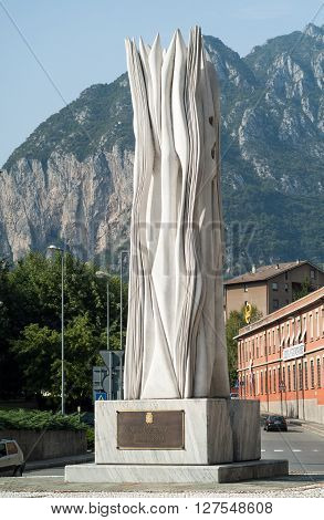 Lecco, Italy - September 1st 2015: Photo of a monument the Italian town of Lecco in honor of those who helped the culture and the economy.