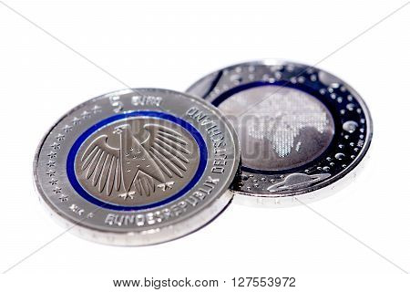 First German five euro coin with blue polymer ring