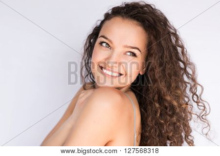smile happy woman young curls beautiful background