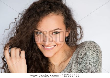 smile happy woman young curls beautiful on white background.