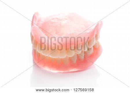 Human teeth model on the white table