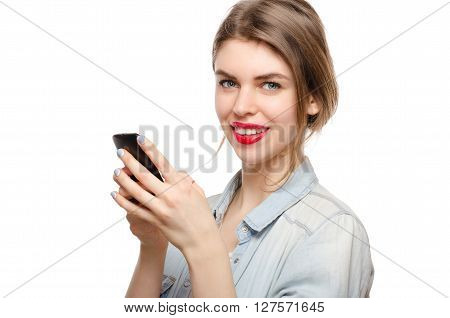 Beautiful Young Woman Chatting Sms Or Serfing The Internet By Mobile Phone, On A White Background