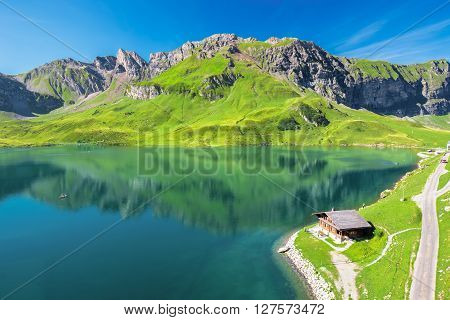 MELCHSEE FRUTT SWITZERLAND AUGUST 27 2015 - View to Melchsee Frutt and Swiss Alps panorama from Melchsee Frutt Switzerland Europe