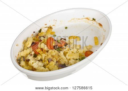 Pasta with cheese gratain in an oval dish isolated on white background  focus stacking.