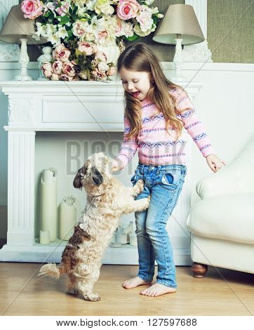 happy girl with her dog at home