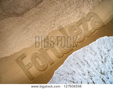 Fortaleza written on the beach