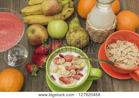 healthy and balanced breakfast fruits milk and cereals