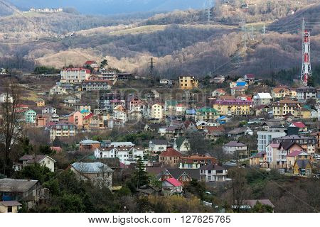 Houses on the background of mountains. Sochi. Russia