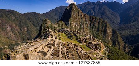 Machu Picchu, PERU in October 2015: Where the Incas used to live nowadays thousands of tourists come to see the Inca heritage. Machu Picchu is in a picturesque setting in the Peruvian Andes.