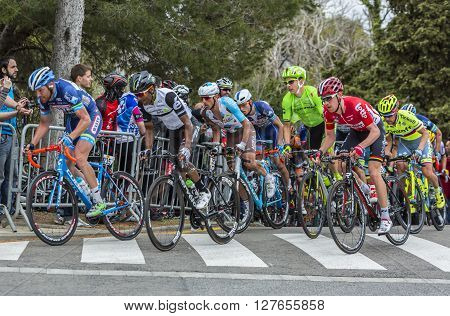 Barcelona Spain - March,27 2016: The peloton riding during Volta Ciclista a Catalunya on the top of Montjuic in Bracelona Spain on March 27 2016.
