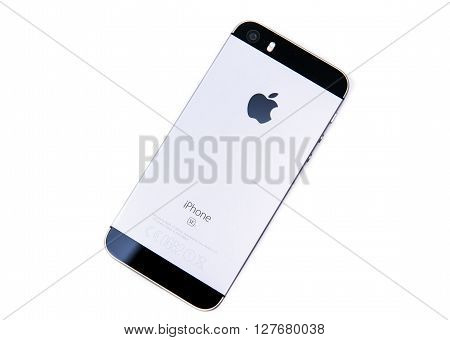 PARIS FRANCE - APR 21 2016: Rear view of the new Apple iPhone SE combining the updated processor 4K rear camera touch id retina display