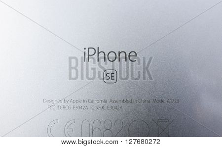 PARIS FRANCE - APR 21 2016: The new Apple iPhone SE combining the updated processor 4K rear camera touch id retina display