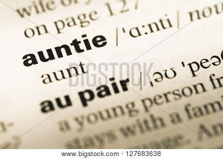 Close Up Of Old English Dictionary Page With Word Auntie.