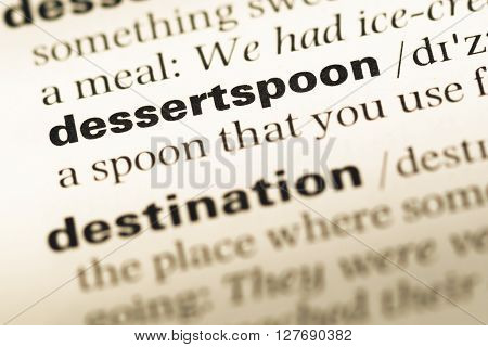 Close Up Of Old English Dictionary Page With Word Dessertspoon.