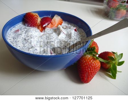 Bowl Of A Yoghurt With Strawberries
