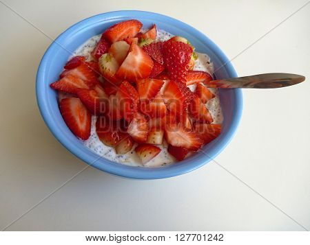 Bowl Of A Yoghurt With Strawberries