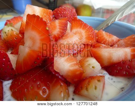 Bowl Of A Yoghurt With Strawberries
