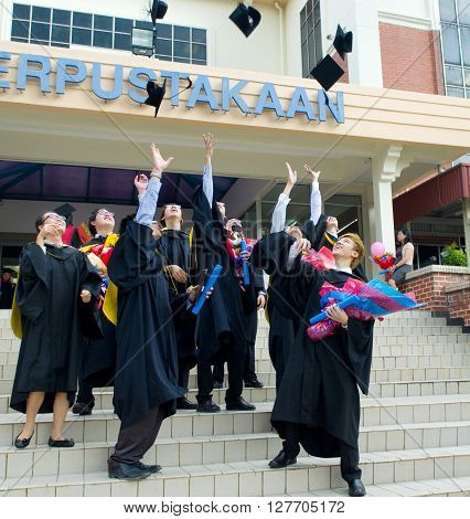 Setapak Kuala Lumpur Malaysia. Nov 07 2015:Graduates from Universiti Tunku Abdul Rahman (UTAR) share their joy with friends during convocation.UTAR is a leading public university in Malaysia.