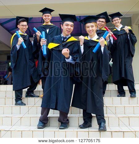 Setapak Kuala Lumpur Malaysia. Nov 07 2015:Graduates from Universiti Tunku Abdul Rahman (UTAR) share their joy with friends during convocation.UTAR is a leading public university in Malaysia.
