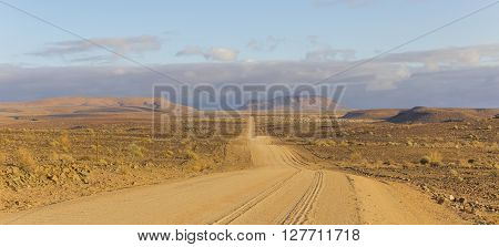 The C12 scenic dirt road in the desert leading to the Fish River Canyon Namibia